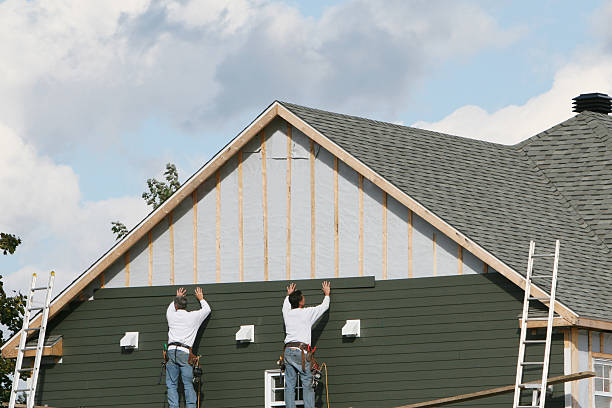 Professional Siding technician working in Lillington, NC